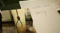A noose that was found hanging in the plant and graffiti marking the bathroom "White's Only."