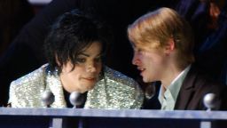 Michael Jackson and Macaulay Culkin attending Michael Jackson's 30th Anniversary Celebration - Audience and Backstage (Photo by Kevin Kane/WireImage)