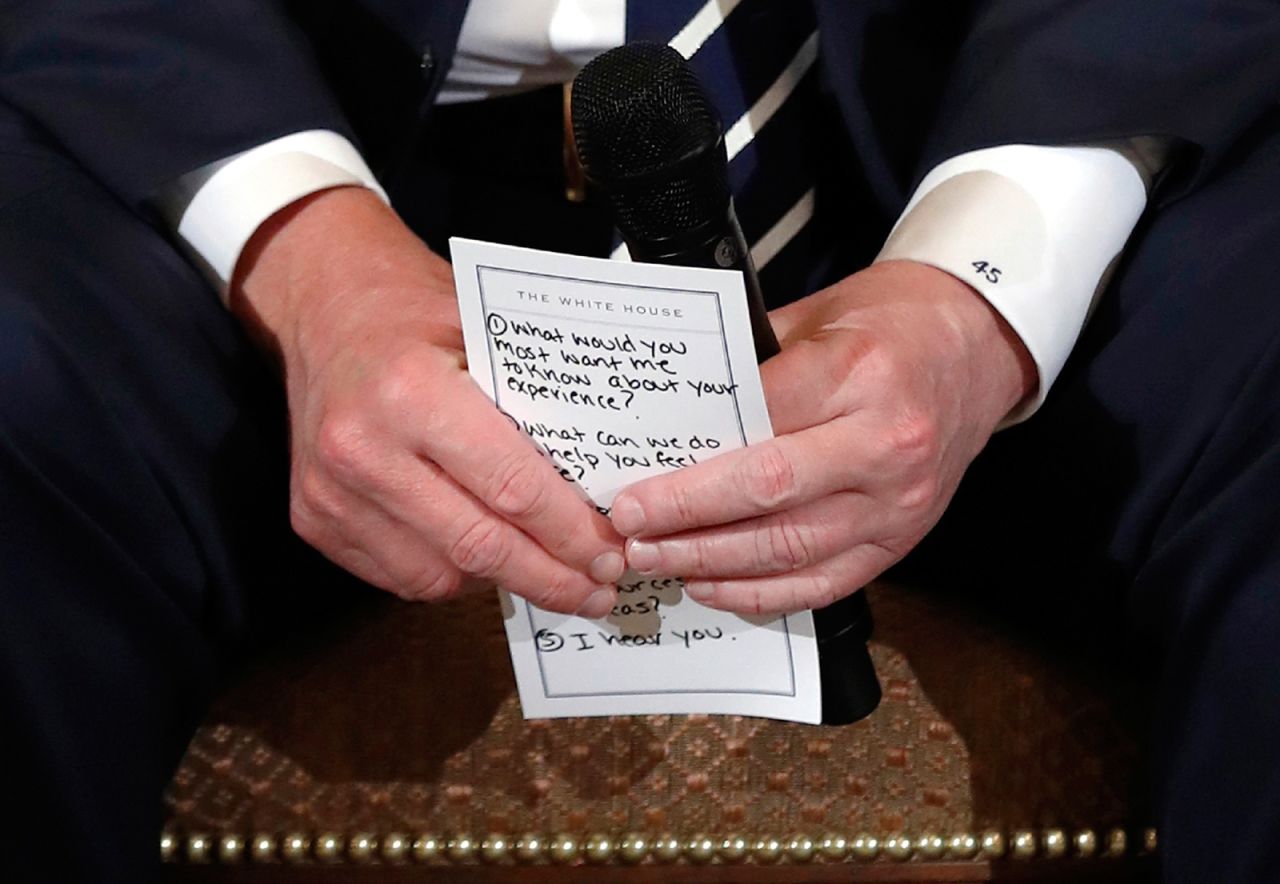 President Trump holds his notes while hosting <a href="https://www.cnn.com/2018/02/21/politics/trump-listening-sessions-parkland-students/index.html" target="_blank">a listening session</a> on February 21 with student survivors of mass shootings and their parents and teachers. <a href="https://www.cnn.com/2018/02/21/politics/trump-parkland-notecard/index.html" target="_blank">The visible points</a> included prompts such as "1. What would you most want me to know about your experience?" "2. What can we do to help you feel safe?" and "5. I hear you." Photographer Carolyn Kaster said, "The big picture can be in the small details. My job is to gather visual information to tell the story. We photograph everything we see. It can be so interesting what you see when you are paying attention beyond what is presented."