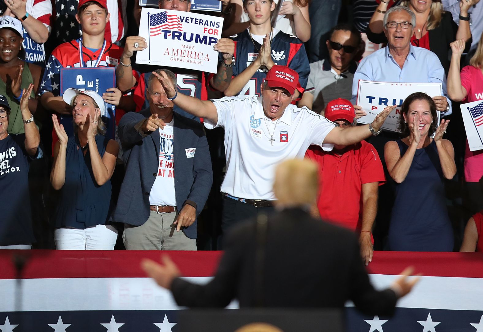 People cheer as President Trump looks at them during a campaign rally in Estero, Florida, on October 31. Trump traveled across the country to help get out the vote for Republican candidates running in <a href="https://www.cnn.com/2018/11/05/politics/gallery/america-votes-2018/index.html" target="_blank">the midterm elections.</a>