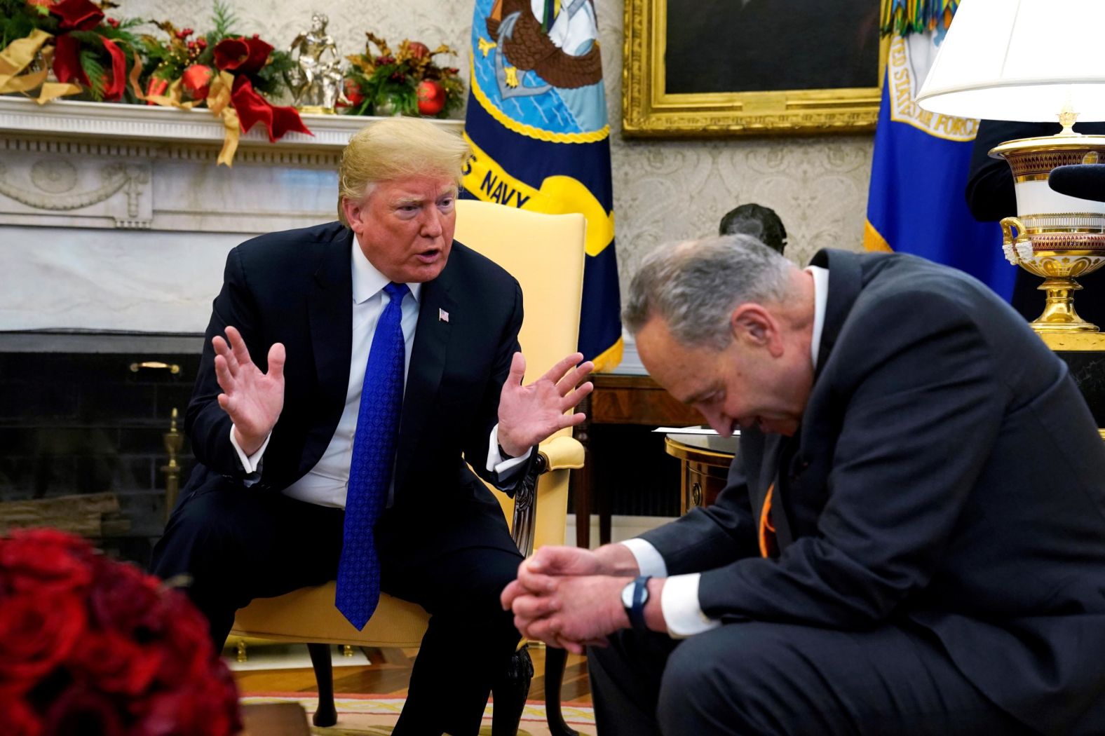 Trump and Senate Minority Leader Chuck Schumer are seen during a meeting in the Oval Office with House Minority Leader Nancy Pelosi and Vice President Mike Pence. In the meeting, part of which was open to the media, <a href="https://www.cnn.com/2018/12/12/politics/gallery/trump-pelosi-schumer-oval-office/index.html" target="_blank">Trump clashed with Schumer and Pelosi over funding for a border wall</a> and the threat of a government shutdown. "I am proud to shut down the government for border security, Chuck," Trump said.