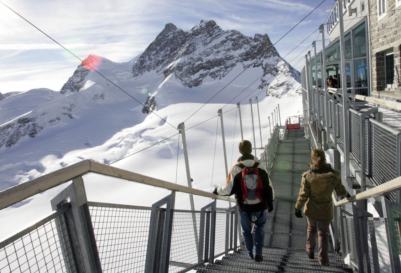 Another cog railway travels up through the heart of the Eiger to the Jungfraujoch and its observatory at the head of the vast Aletsch glacier. The summit of the Jungfrau at 4,158 meters (13,641 feet) is in the distance.