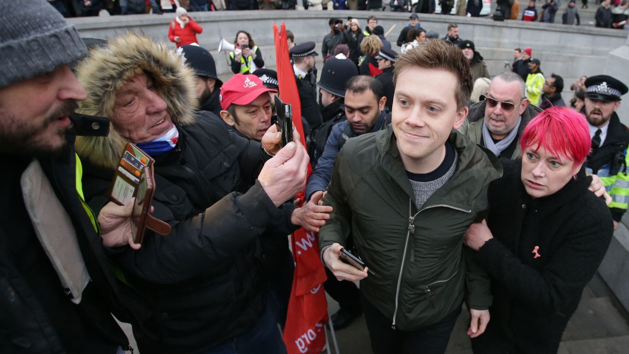 Guardian columnist Owen Jones is confronted by right-wing protesters after attending a demonstration in central London on January 12.
