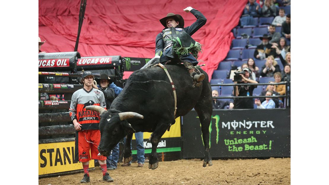 Mason Lowe rides a bull at the Scottrade Center in St. Louis, Missouri, last year.