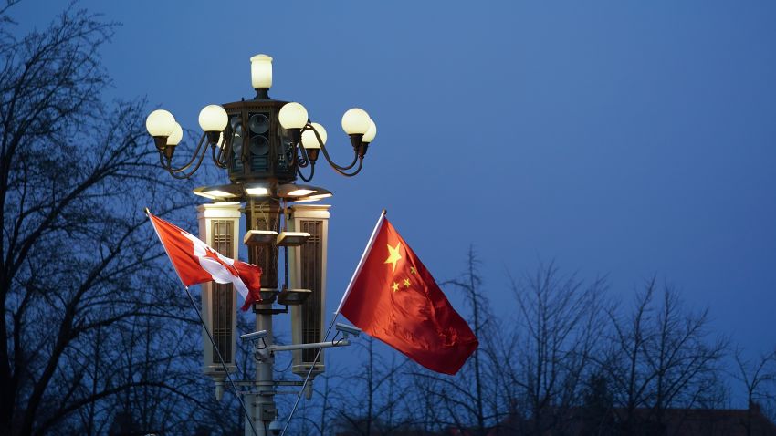 BEIJING, CHINA - DECEMBER 04:  China and Canada flag is displayed in front of the Forbidden City on December 4, 2017 in Beijing, China. At the invitation of Premier Li Keqiang of the State Council of China, Prime Minister of Canada, Justin Trudeau will pay an official visit to China from Dec 3 to 7.  (Photo by Lintao Zhang/Getty Images)