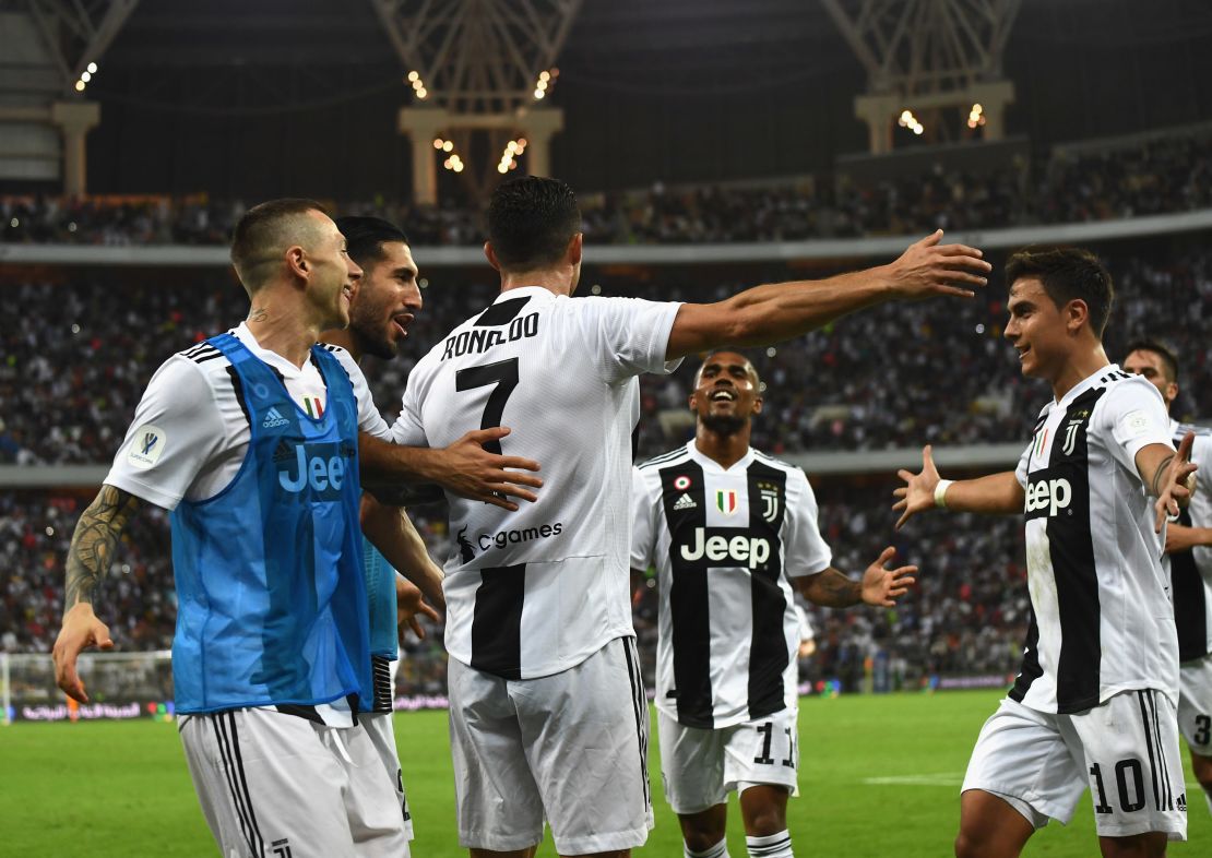 Ronaldo celebrates with his Juve teammates after scoring his side's only goal during the Italian Super Cup.