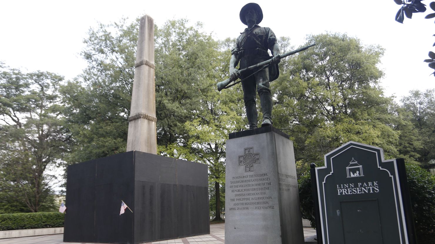 The covered up monument is pictured here on the far left. 