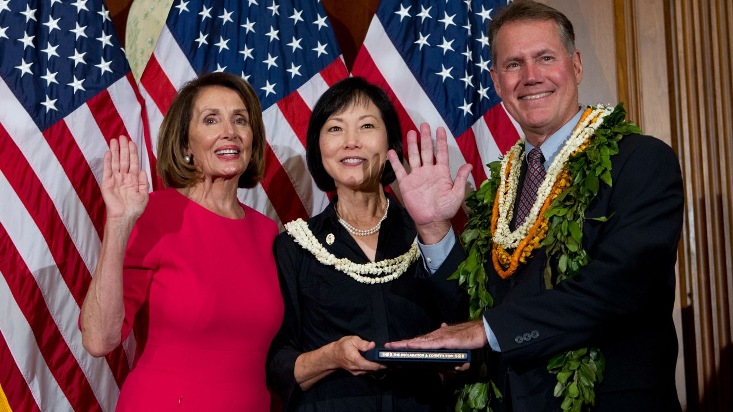 House Speaker Nancy Pelosi of Calif., administers the House oath of office to Rep. Ed Case, D-Hawaii, during ceremonial swearing-in on Capitol Hill in Washington, Thursday, Jan. 3, 2019, during the opening session of the 116th Congress. (AP Photo/Jose Luis Magana)