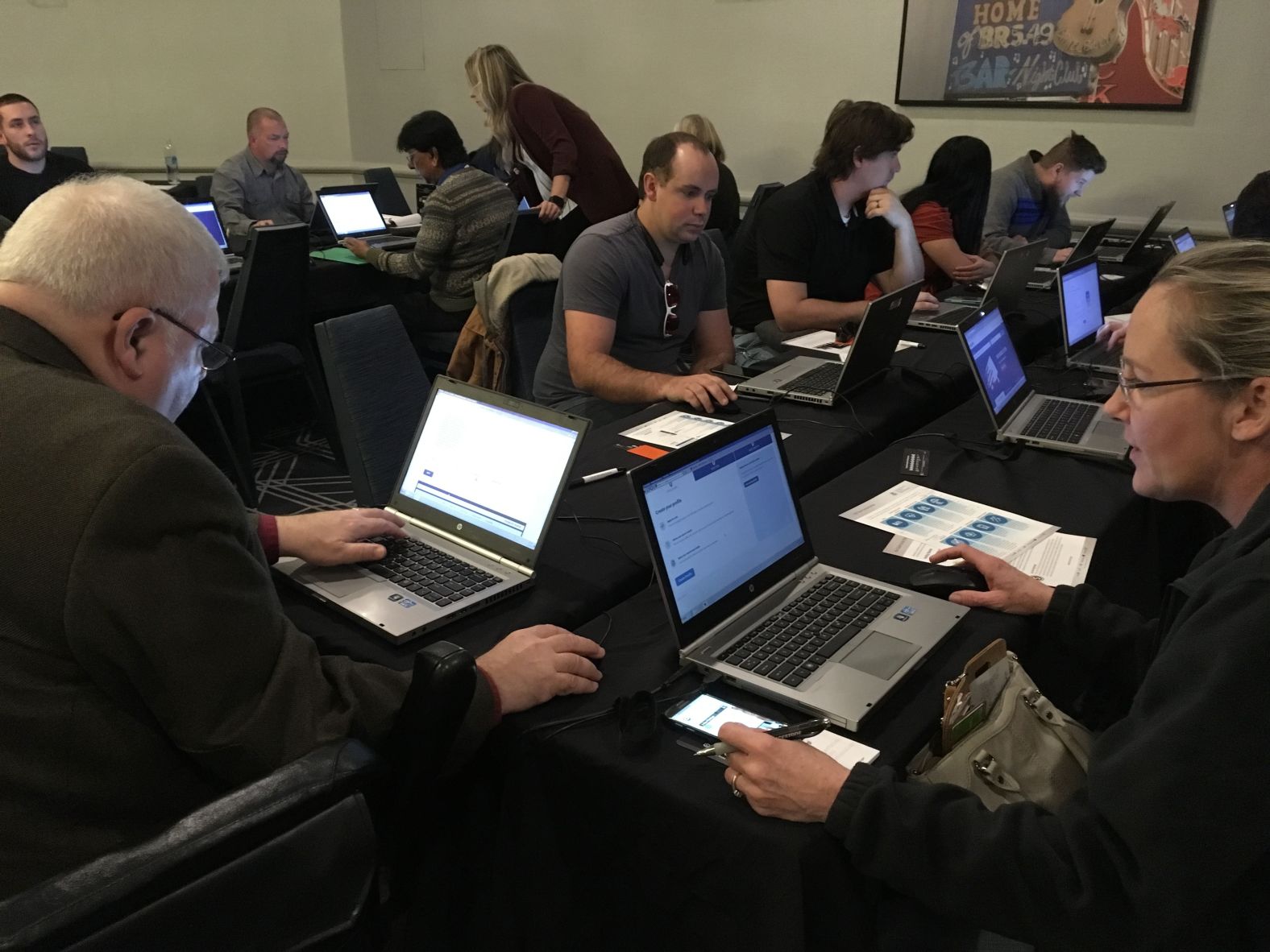 Job seekers fill out information during a TSA fast-track hiring event in Nashville on Saturday, January 12.