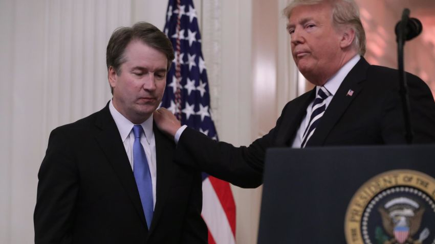 WASHINGTON, DC - OCTOBER 08: U.S. President Donald Trump (R) puts his hand on Supreme Court Associate Justice Brett Kavanaugh's shoulder during his ceremonial swearing in in the East Room of the White House October 08, 2018 in Washington, DC. Kavanaugh was confirmed in the Senate 50-48 after a contentious process that included several women accusing Kavanaugh of sexual assault. Kavanaugh has denied the allegations.  (Photo by Chip Somodevilla/Getty Images)