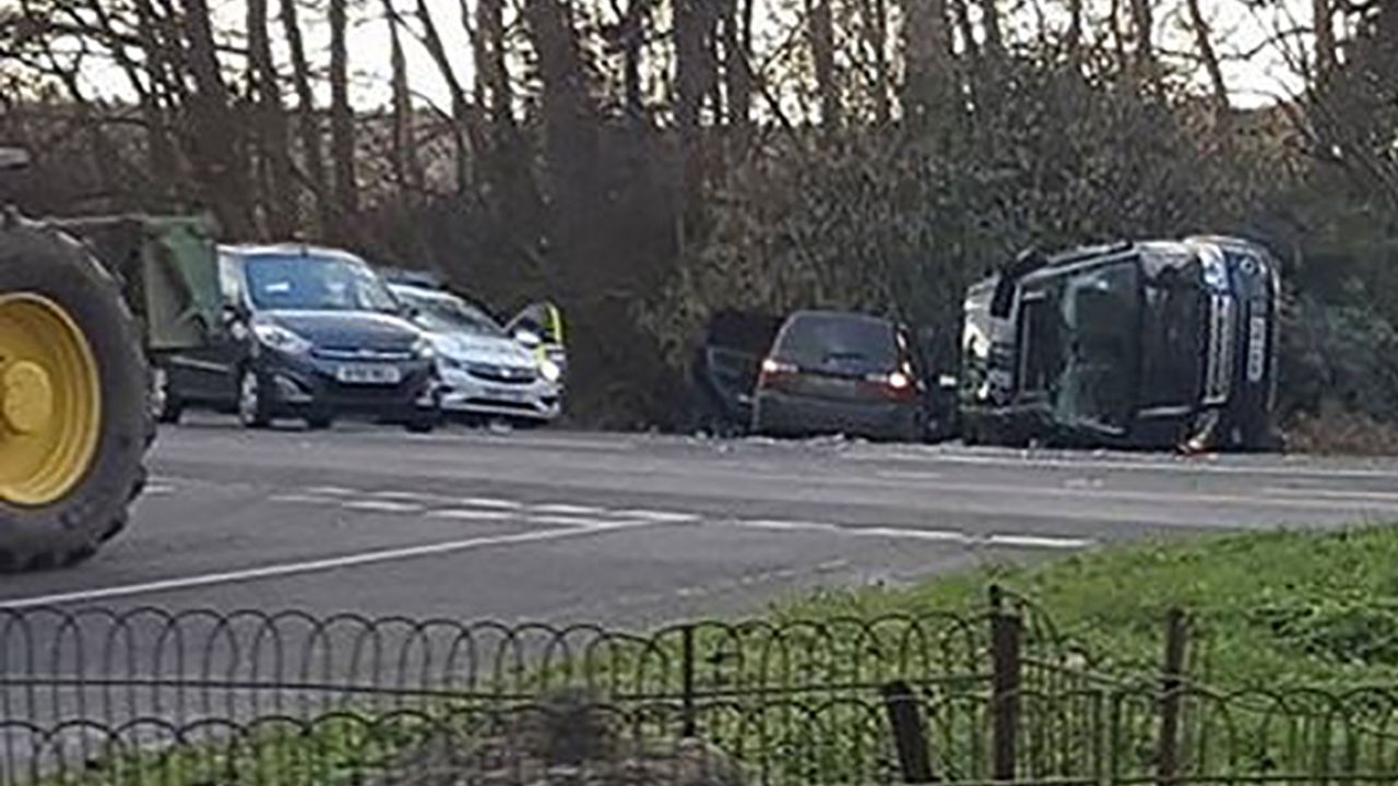 Prince Philip's Range Rover lies on its side following the crash near Sandringham.