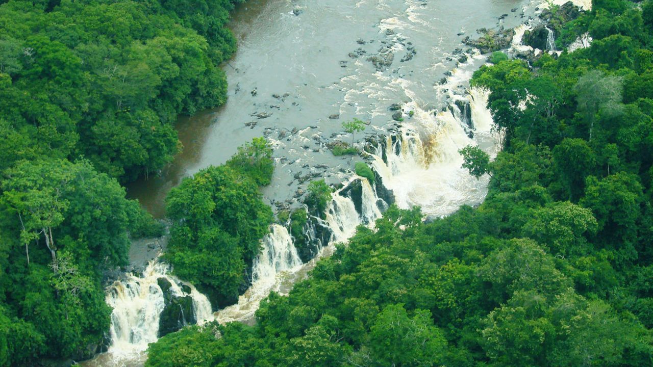The thundering Arabia Waterfall inside the Okapi Reserve.