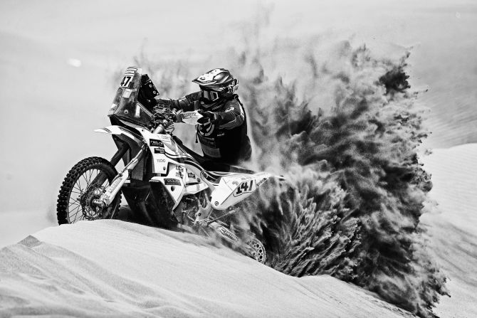 Richard Main leaves a massive trail of sand in his wake on board his Redline KTM on stage six.
