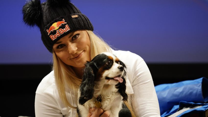 CORTINA D'AMPEZZO, ITALY - JANUARY 16 : Lindsey Vonn of USAand her dog Lucy  at a press conference during the Audi FIS Alpine Ski World Cup Women's Downhill on January 16, 2019 in Cortina d'Ampezzo Italy. (Photo by Francis Bompard/Agence Zoom/Getty Images)