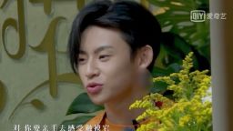A contestant on the Chinese reality TV show Little Sister's Flower Shop is seen with an ear lobe blurred.