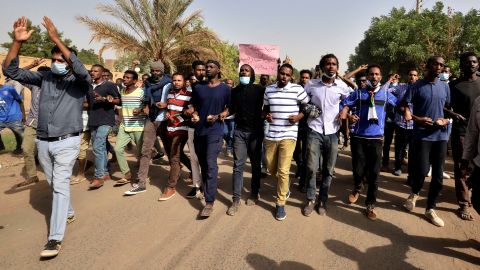 Sudanese demonstrators chant slogans as they participate in anti-government protests in Khartoum on Thursday.