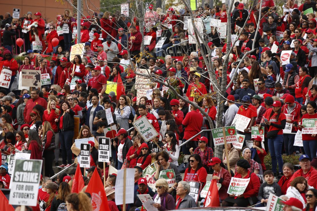 Teachers, parents and students gather Friday near Los Angeles City Hall.