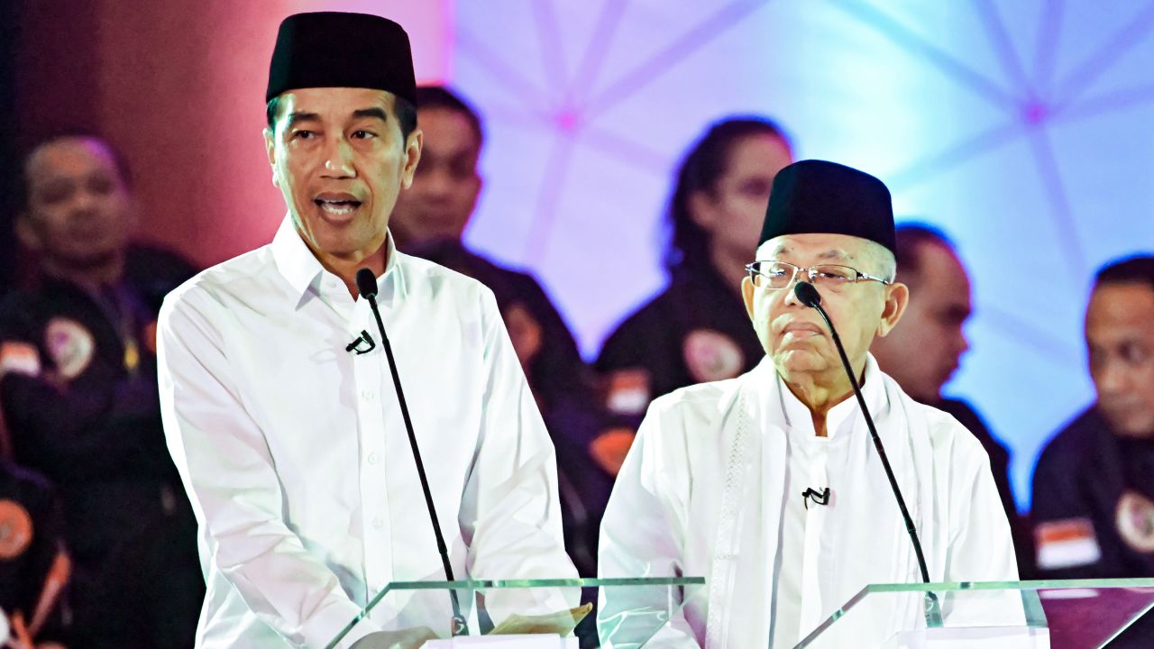 Presidential candidate and incumbent President Joko Widodo, pictured left, and his running mate, Maruf Amin, during a live nationwide TV debate in Jakarta on January 17.