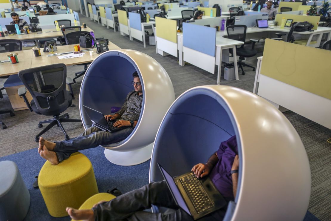 Employees work at Flipkart's headquarters in Bengaluru, India, in 2017.