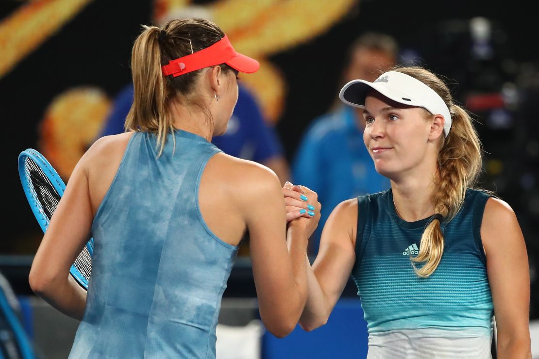 Maria Sharapova (left) and Caroline Wozniacki shake hands after Sharapova won their match at the Australian Open. 