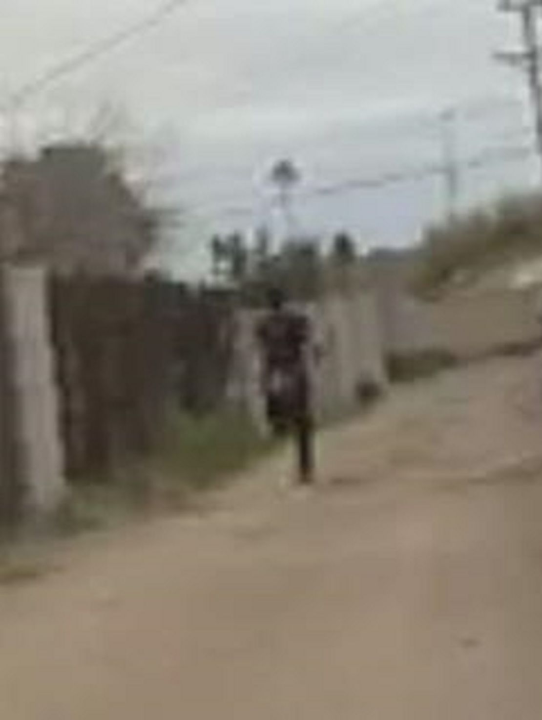 Video from the body camera worn by the officer shows the 14-year-old running away before he was shot. 