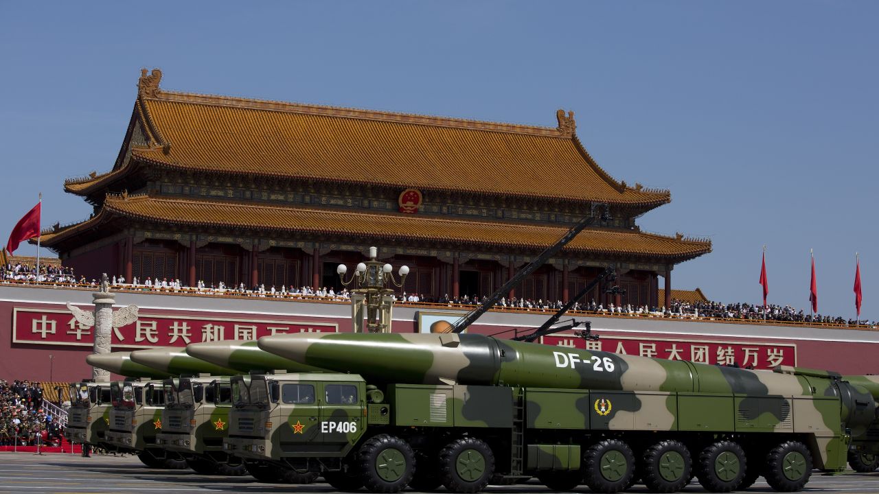 Chinese military vehicles carrying DF-26 ballistic missiles drive are seen during a 2015 military parade in Beijing.