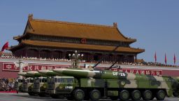BEIJING, CHINA - SEPTEMBER 03: Military vehicles carrying DF-26 ballistic missiles, drive past the Tiananmen Gate during a military parade to mark the 70th anniversary of the end of World War Two on September 3, 2015 in Beijing, China. China is marking the 70th anniversary of the end of World War II and its role in defeating Japan with a new national holiday and a military parade in Beijing. (Photo by Andy Wong - Pool /Getty Images)