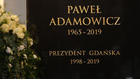 The tombstone of Gdansk Mayor Pawel Adamowicz hangs on a wall prior to his funeral in St. Mary's Basilica, Gdansk, on Saturday.