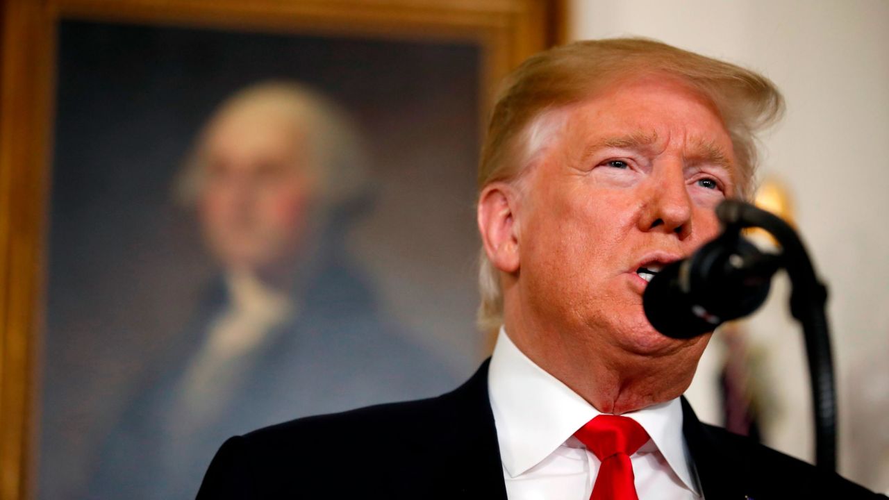 President Donald Trump speaks about the partial government shutdown, immigration and border security in the Diplomatic Reception Room of the White House, in Washington, Saturday, Jan. 19, 2019. (AP Photo/Alex Brandon)