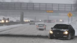A vehicle spins out on Interstate 94 in Detroit, Saturday, Jan. 19, 2019. The massive storm dumped 10 inches of snow on some areas of the Midwest. Following the storm system, some areas were expecting high winds and bitter cold, and in Iowa, temperatures in the teens Saturday were expected to drop below zero overnight, producing wind chills as low as 20-below by Sunday morning. (AP Photo/Paul Sancya)