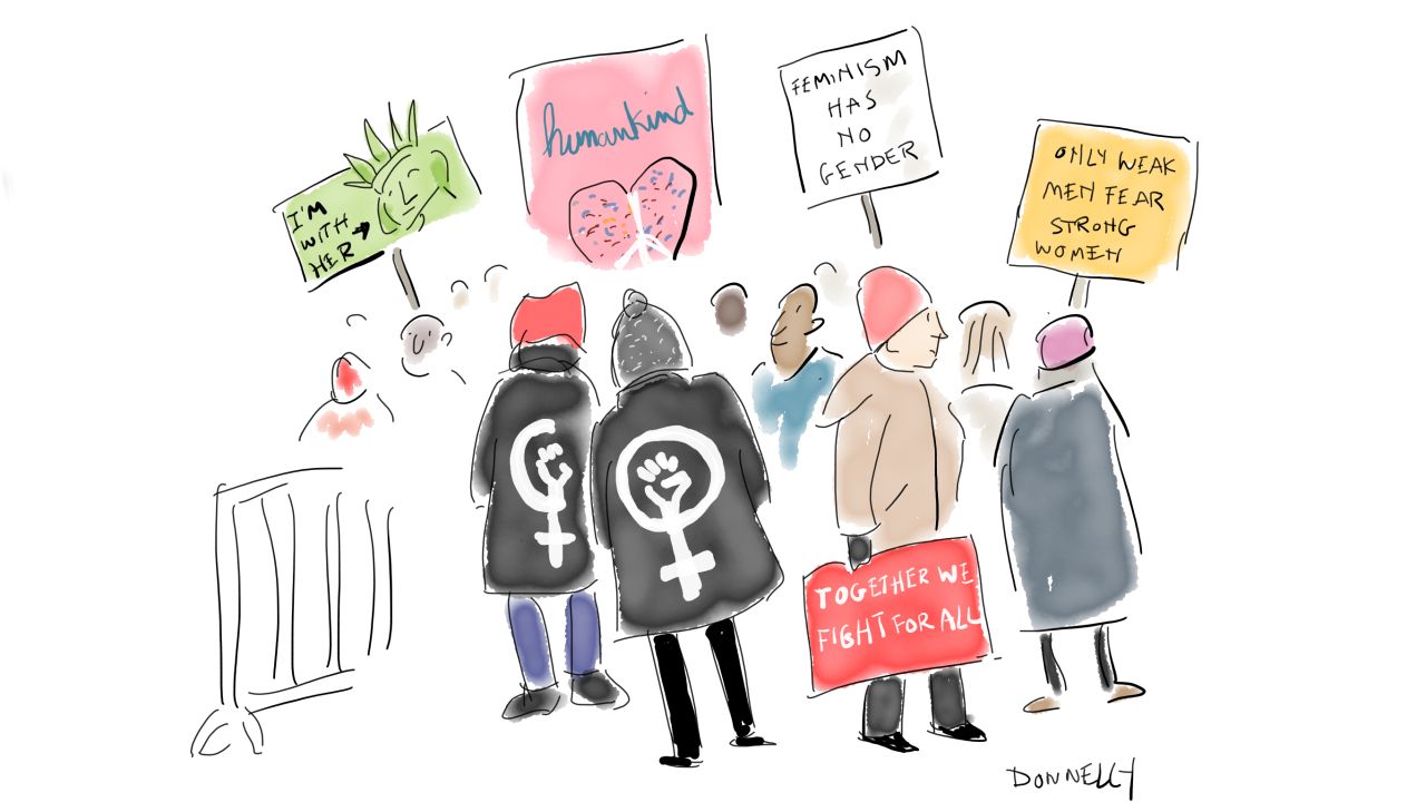 Marchers expressed their feelings with signs. Many were angry, but others sought inclusion and love.