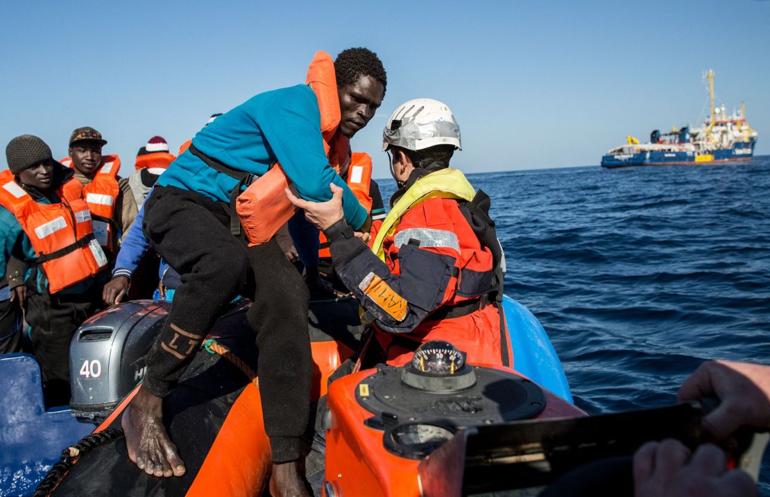 A group of 47 migrants is transfered from a rescued unflatable boat onto Sea Watch 3.