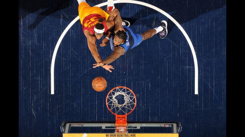 Myles Turner of the Indiana Pacers, left, and DeAndre Jordan of the Dallas Mavericks compete for a rebound during an NBA game on Saturday, January 19 at Bankers Life Fieldhouse in Indianapolis.