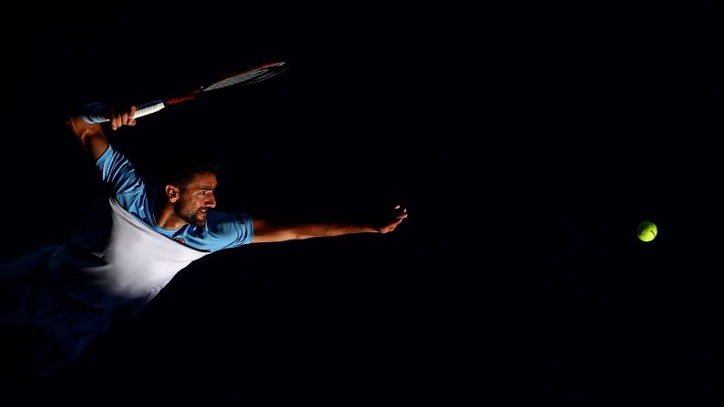 Marin Cilic serves during a match against Roberto Bautista on day seven of the Australian Open in Melbourne on Sunday, January 20.
