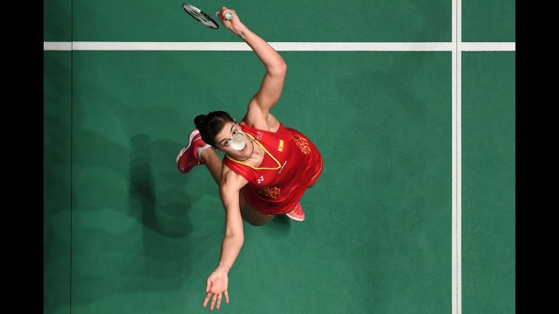 Carolina Marin of Spain hits a return against Sung Ji Hyun of South Korea in their women's singles match at the Malaysia Masters badminton tournament in Kuala Lumpur on Friday, January 18.