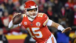 KANSAS CITY, MISSOURI - JANUARY 20: Patrick Mahomes #15 of the Kansas City Chiefs scrambles in the first half against the New England Patriots during the AFC Championship Game at Arrowhead Stadium on January 20, 2019 in Kansas City, Missouri. (Photo by Peter Aiken/Getty Images)