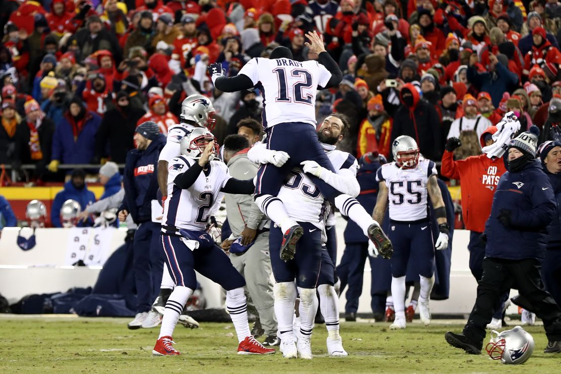 Tom Brady of the New England Patriots celebrates with teammates after they defeated the Kansas City Chiefs in overtime.