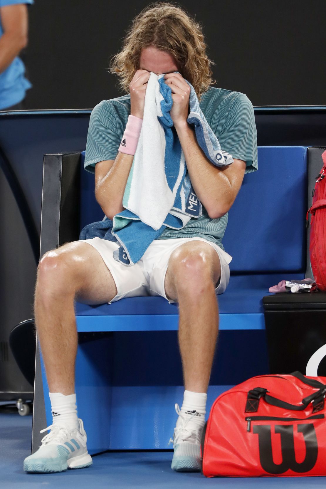 Stefanos Tsitsipas takes it all in after seeing off his idol Roger Federer in Melbourne. 