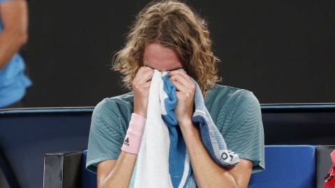 Stefanos Tsitsipas takes it all in after seeing off his idol Roger Federer in Melbourne.