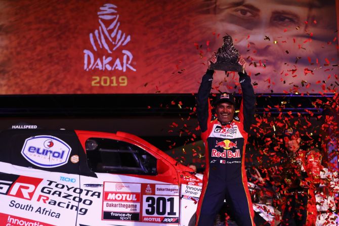 Nasser Al-Attiyah of Qatar celebrates his Dakar Rally victory.