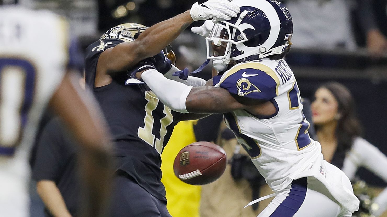 Tommylee Lewis of the New Orleans Saints drops a pass broken up by Nickell Robey-Coleman of the Los Angeles Rams late in the NFC Championship game on January 20 in New Orleans.