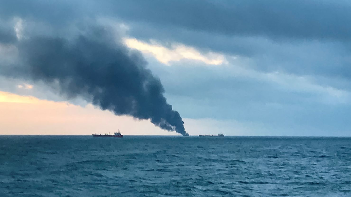 Smoke rises from ships in the Kerch Strait near Crimea on Monday.