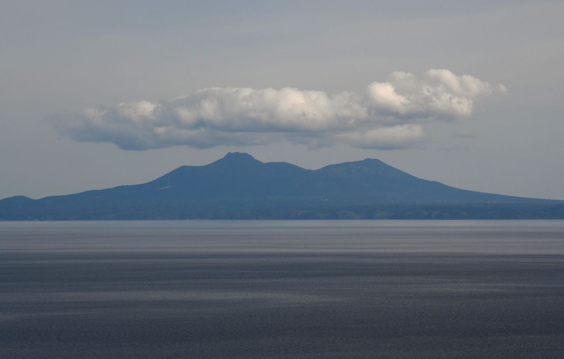 Kunashiri island, part of an archipelago under Russian control, seen from the Rausu Kunashiri Observatory Deck in Rausu, Hokkaido prefecture. 