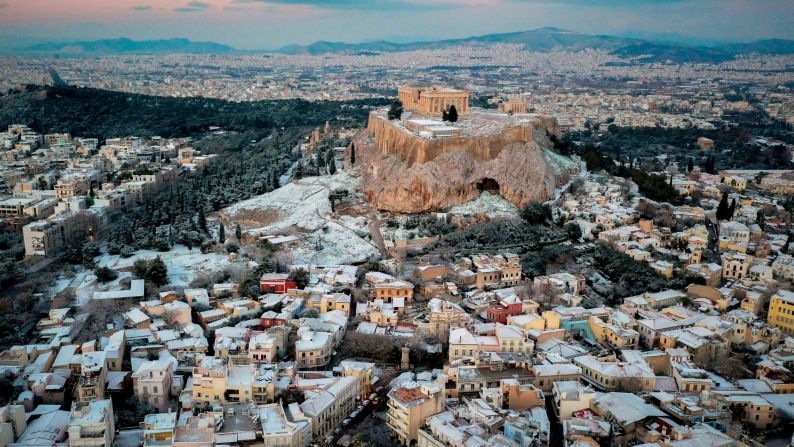 <strong>Athens: </strong>In early January, snow covers part of the ancient Acropolis hill and Athens' Plaka district, also known as the "Neighborhood of the Gods." 