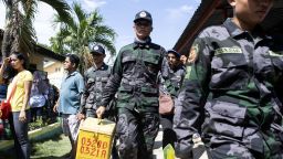 A policeman carries a ballot box at a voting precinct in Cotabato on the southern Philippine island of Mindanao on January 21, 2019, during a vote on giving the nation's Muslim minority greater control over the region. - A decades-long push to halt the violence that has claimed some 150,000 lives in the southern Philippines culminated on January 21 with a vote on giving the nation's Muslim minority greater control over the region. (Photo by Noel CELIS / AFP)        (Photo credit should read NOEL CELIS/AFP/Getty Images)