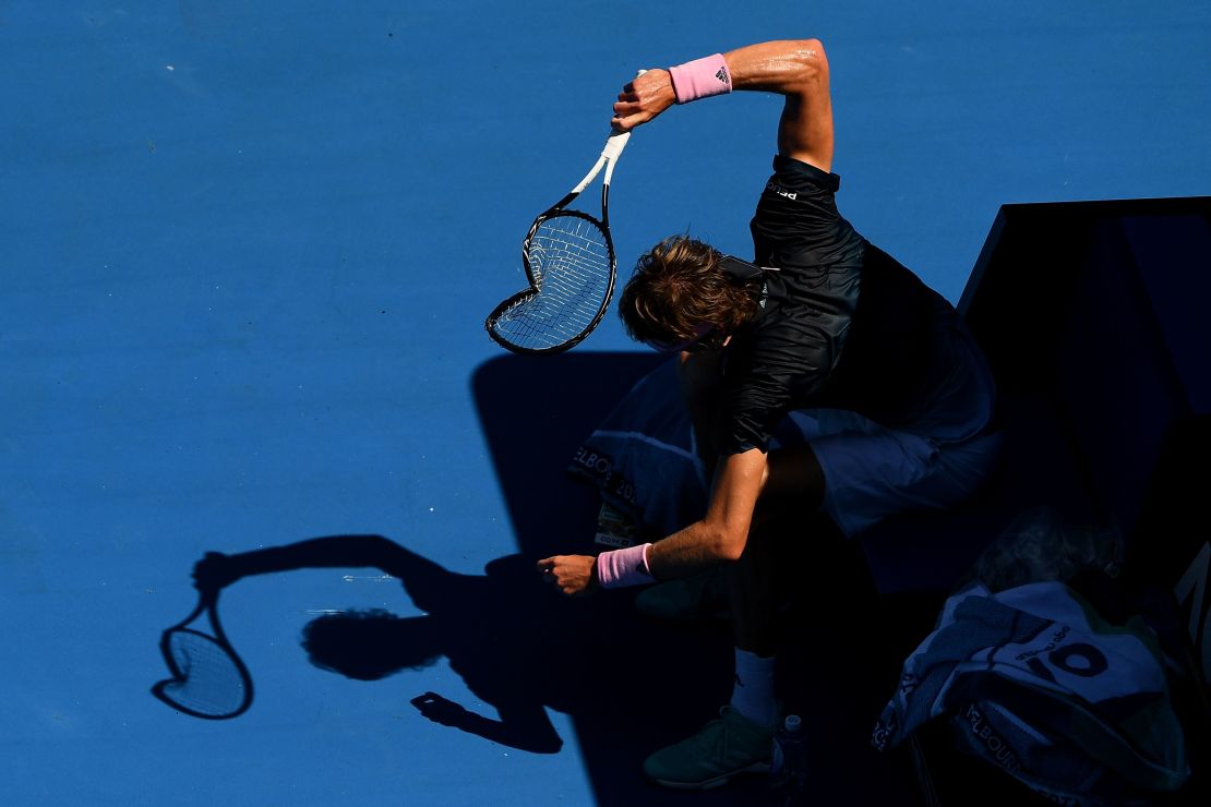 Alexander Zverev smashes his racket in a loss to Milos Raonic at the Australian Open. 