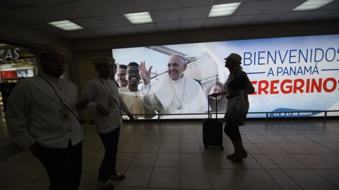 A sign with a photo of Pope Francis, reading "Welcome to Panama, Pilgrims," at the Tocumen airport ahead of World Youth Day.