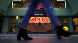 A pedestrians passes in front of an AMC Entertainment Inc. movie theater in Santa Monica, California, U.S., on Tuesday, Feb. 27, 2018. AMC Entertainment is scheduled to release earnings figures on March 1. Photographer: Patrick T. Fallon/Bloomberg via Getty Images