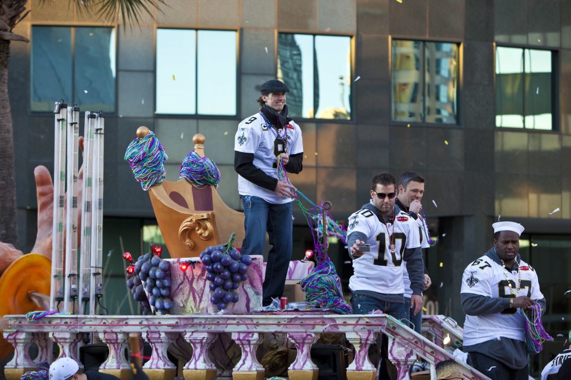 New Orleans Saints Quarterback Drew Brees and teammates celebrate during the New Orleans Saints Super Bowl XLIV Victory Parade in 2010 in New Orleans.