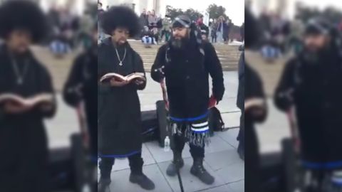 Another video shows members of the Hebrew Israelites agitating others in the crowd.